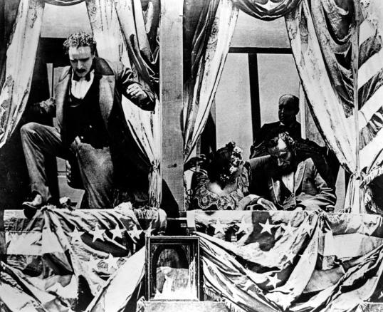 John Wilkes Booth (Raoul Walsh) flees after shooting Abraham Lincoln in D.W. Griffith's Birth Of A Nation